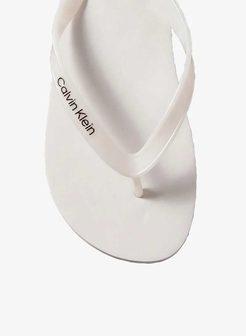 CALVIN KLEIN  Arwa - Metallic Pearlised Flip Flops for Women | Best Price UAE
